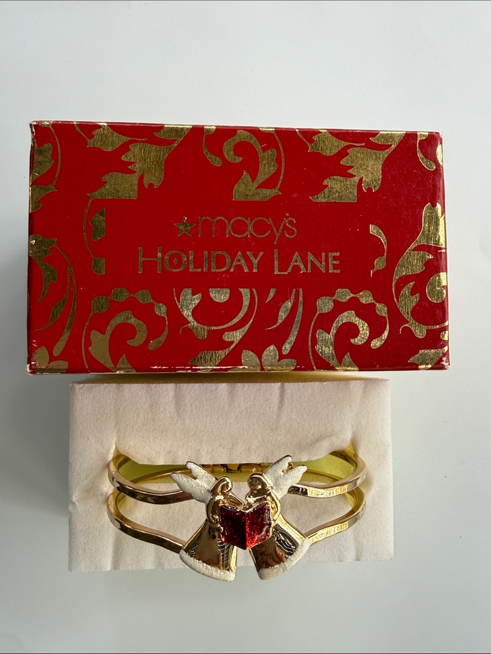 NWT Macy's Holiday Lane Gold Tone Cuff Bracelet with Red and White Angel Accent